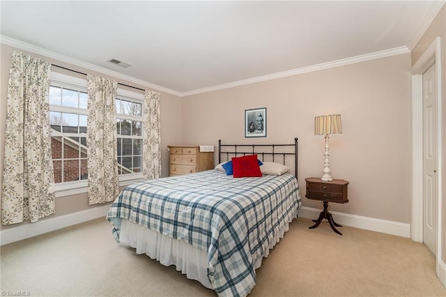 carpeted bedroom featuring crown molding