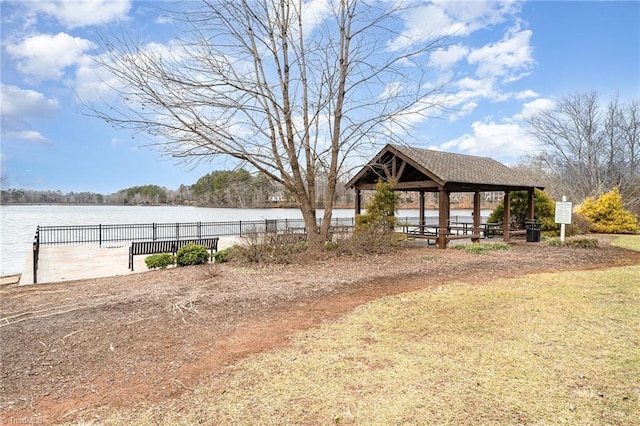 view of property's community featuring a gazebo and a water view