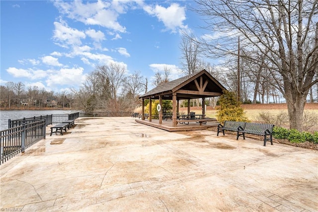 view of home's community featuring a gazebo and a water view