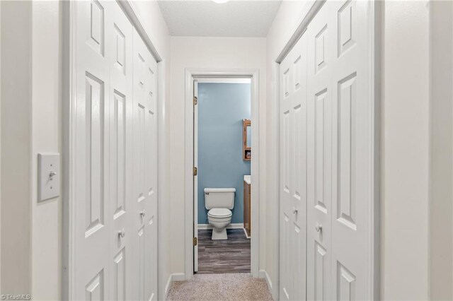 corridor featuring light hardwood / wood-style flooring