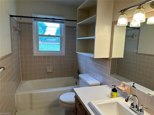 5912 US Highway 21, Jonesville, NC 28642 - full bathroom with tile walls, toilet, vanity, and shower / bath combination