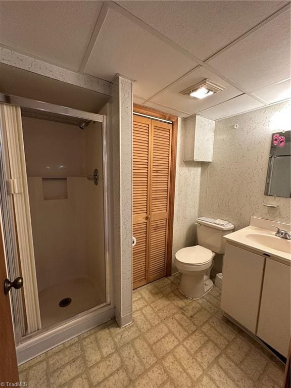 5912 US Highway 21, Jonesville, NC 28642 - bathroom featuring tile patterned floors, toilet, vanity, a shower stall, and a closet