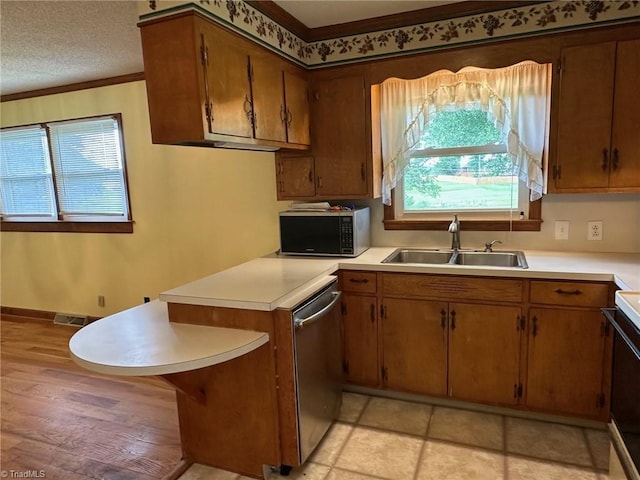 5912 US Highway 21, Jonesville, NC 28642 - kitchen featuring a sink, black microwave, dishwasher, light countertops, and plenty of natural light
