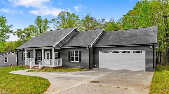 ranch-style home with concrete driveway, a porch, a front lawn, and an attached garage