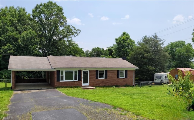 133 Lori Ln, Mount Airy, NC 27030 - ranch-style home with asphalt driveway, brick siding, and a carport