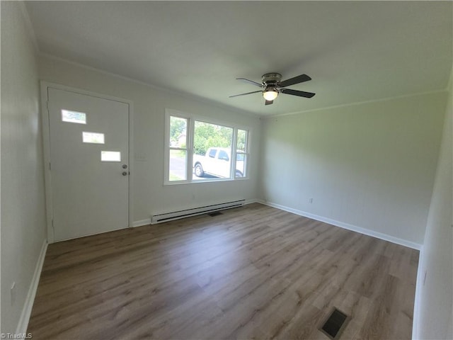 133 Lori Ln, Mount Airy, NC 27030 - entryway with baseboard heating, wood finished floors, and a ceiling fan