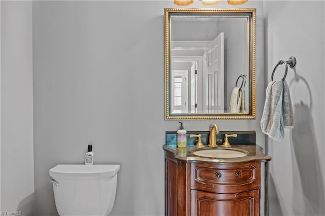 half bath with toilet and vanity