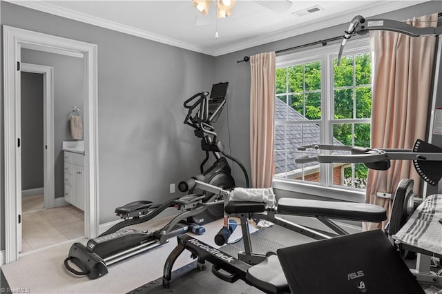 exercise area with ornamental molding, ceiling fan, and baseboards
