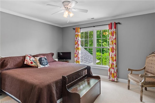 bedroom featuring carpet flooring, baseboards, crown molding, and a ceiling fan