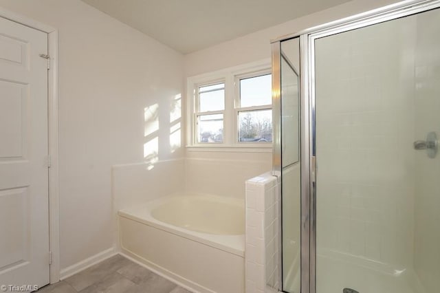 bathroom featuring plus walk in shower