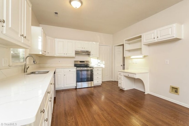 kitchen featuring light stone counters, stainless steel electric stove, sink, and white cabinets