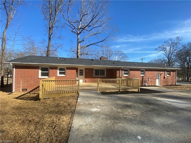 ranch-style house with a deck