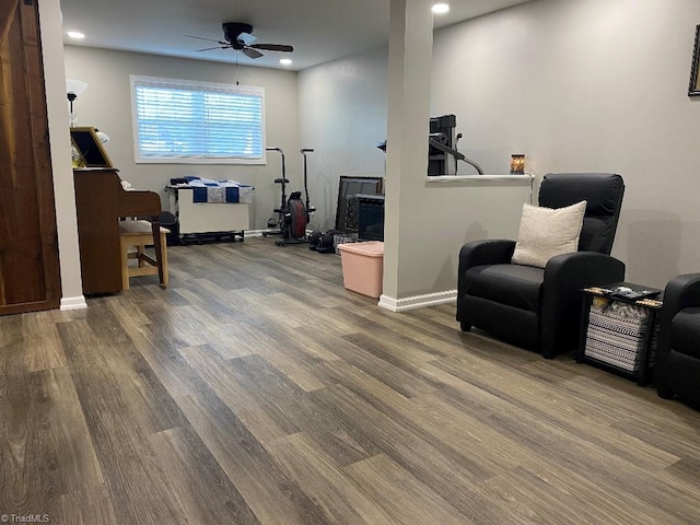 7533 Greenmeadow Dr, Tobaccoville, NC 27050 - living area with wood finished floors, ceiling fan, baseboards, and recessed lighting