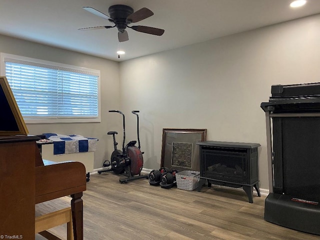 7533 Greenmeadow Dr, Tobaccoville, NC 27050 - exercise area with wood finished floors, ceiling fan, recessed lighting, and baseboards