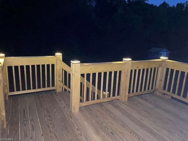 7533 Greenmeadow Dr, Tobaccoville, NC 27050 - view of deck at twilight