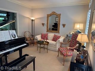 105 Finborough Ct, Kernersville, NC 27284 - sitting room with carpet and crown molding