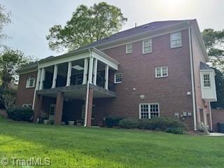 105 Finborough Ct, Kernersville, NC 27284 - back of house with a lawn