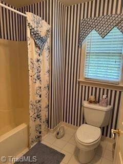 105 Finborough Ct, Kernersville, NC 27284 - full bathroom featuring shower / tub combo with curtain, tile patterned flooring, and toilet