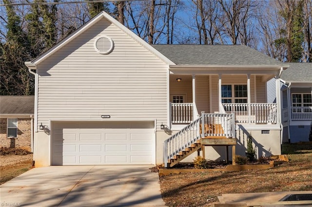 view of front of house with a garage and covered porch