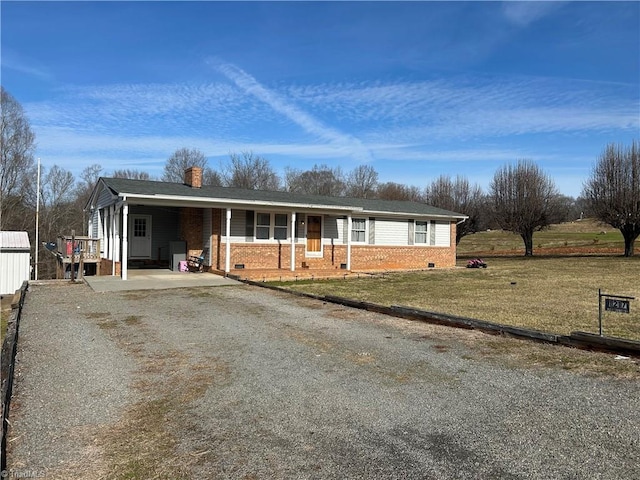 single story home featuring an attached carport, driveway, crawl space, a front lawn, and a chimney