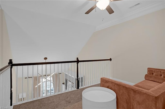 bathroom featuring ceiling fan, ornamental molding, and lofted ceiling