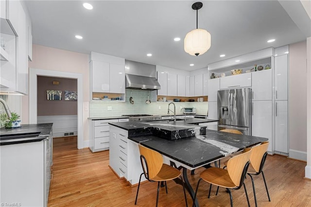 3054 Country Club Rd, Winston-Salem, NC 27104 - kitchen with stainless steel fridge with ice dispenser, modern cabinets, dark countertops, white cabinets, and recessed lighting
