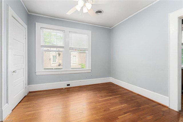 3054 Country Club Rd, Winston-Salem, NC 27104 - unfurnished bedroom with light wood finished floors, crown molding, baseboards, and a ceiling fan