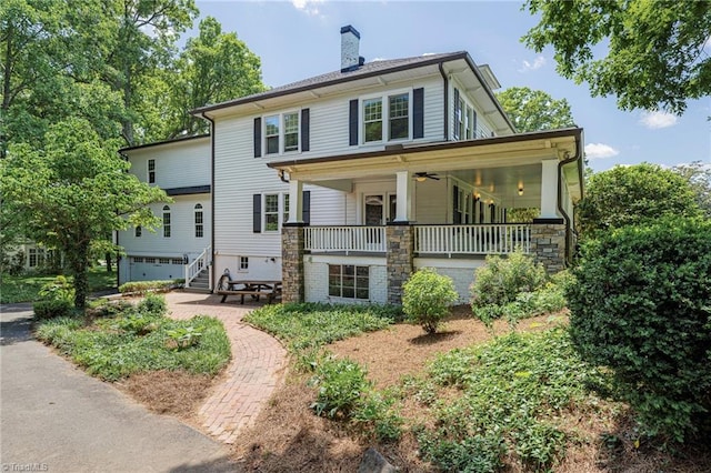 3054 Country Club Rd, Winston-Salem, NC 27104 - rear view of house featuring a chimney, a ceiling fan, an attached garage, stairs, and covered porch