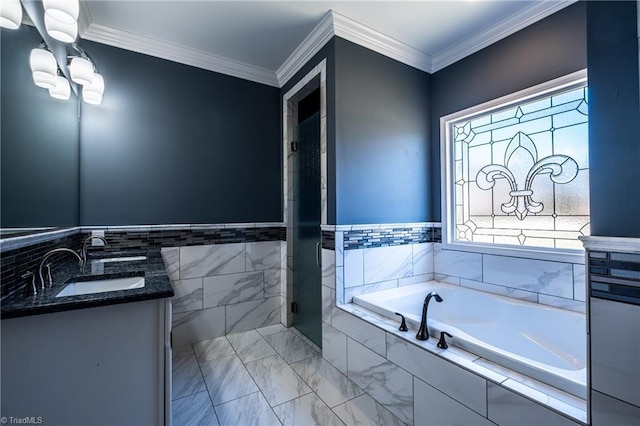 bathroom with a garden tub, a sink, marble finish floor, ornamental molding, and double vanity