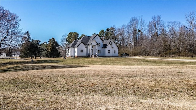 view of front of house with a front lawn