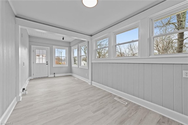 view of unfurnished sunroom