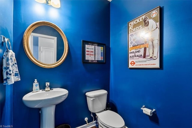 half bathroom with toilet