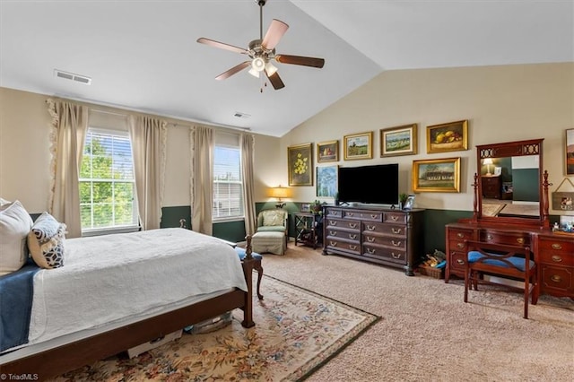 bedroom featuring visible vents, a ceiling fan, carpet floors, and vaulted ceiling