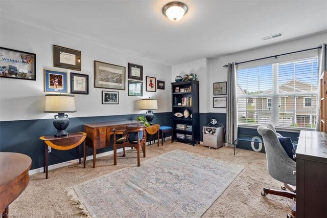 carpeted office featuring visible vents