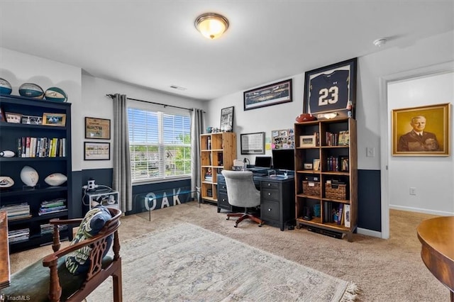 office featuring baseboards and carpet
