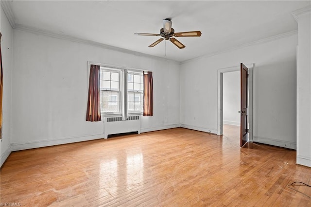 unfurnished room featuring ornamental molding, light wood-style flooring, radiator heating unit, and ceiling fan