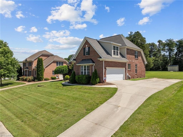 view of front of home featuring a front yard and a garage