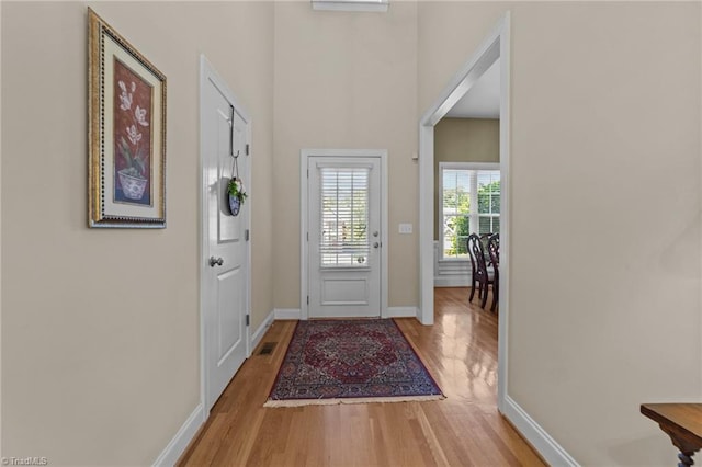 doorway to outside featuring light hardwood / wood-style floors