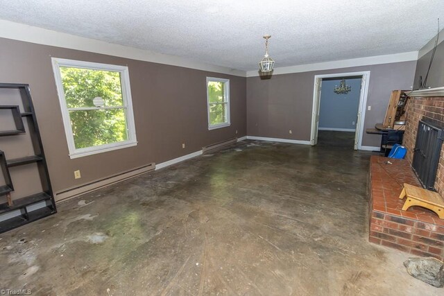 4984 US Highway 220, Asheboro, NC 27205 - unfurnished living room with baseboard heating, unfinished concrete flooring, a textured ceiling, a brick fireplace, and baseboards
