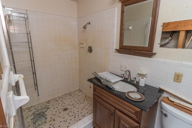 4984 US Highway 220, Asheboro, NC 27205 - bathroom featuring a tile shower, tile walls, toilet, and vanity