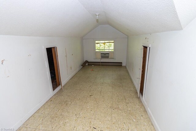 4984 US Highway 220, Asheboro, NC 27205 - bonus room with a baseboard radiator, vaulted ceiling, a textured ceiling, light flooring, and cooling unit