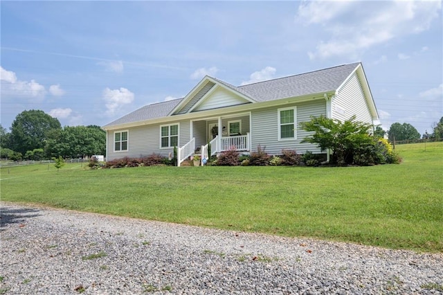 742 Teague Rd, Winston-Salem, NC 27107 - ranch-style house featuring covered porch, a front yard, and roof with shingles