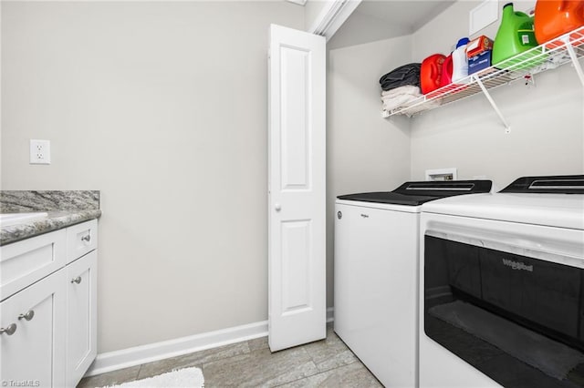 742 Teague Rd, Winston-Salem, NC 27107 - laundry room with washer and dryer and baseboards