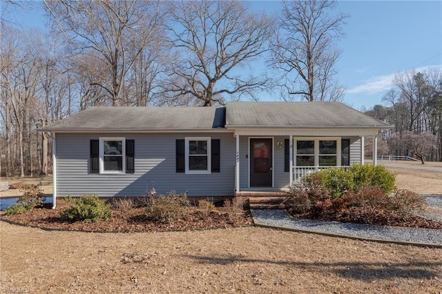 ranch-style home with covered porch