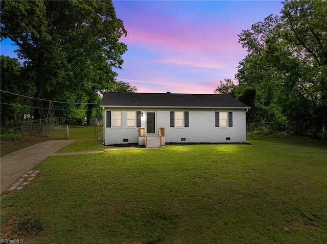 view of front of home featuring driveway and crawl space