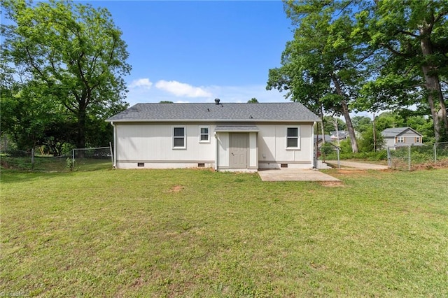 rear view of house featuring crawl space