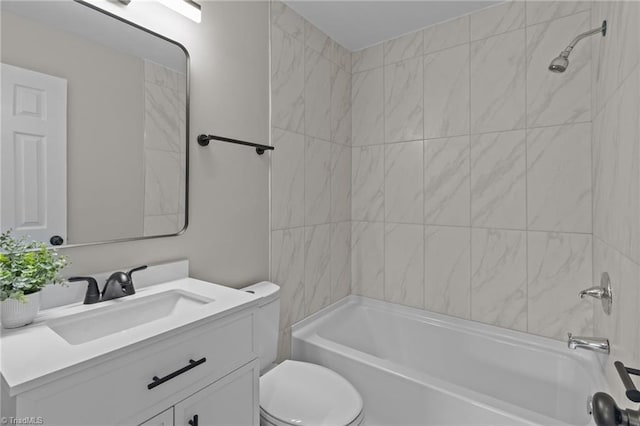 full bathroom with toilet, vanity, and shower / bathtub combination