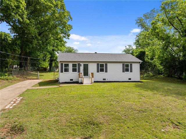 view of front of home featuring driveway, crawl space, and roof with shingles