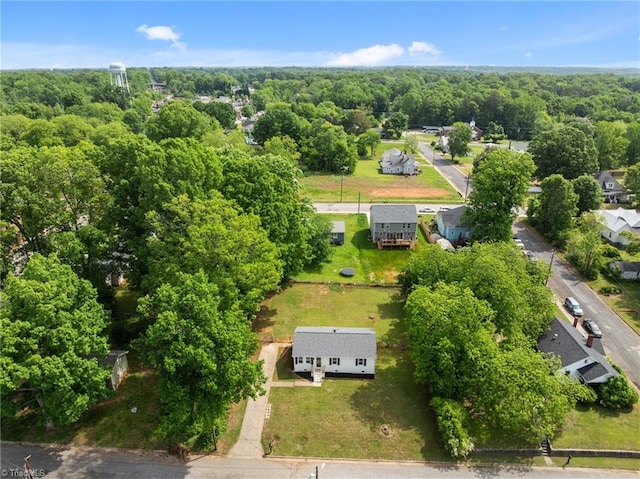 drone / aerial view of a heavily wooded area