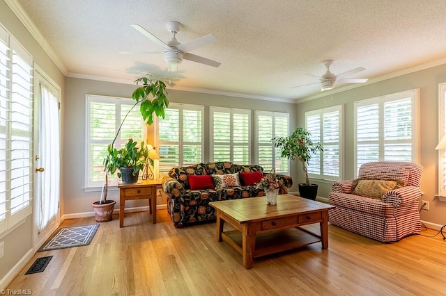 97 Shadylawn Dr, Winston-Salem, NC 27104 - living area with ceiling fan, healthy amount of natural light, light wood-style flooring, a textured ceiling, and crown molding